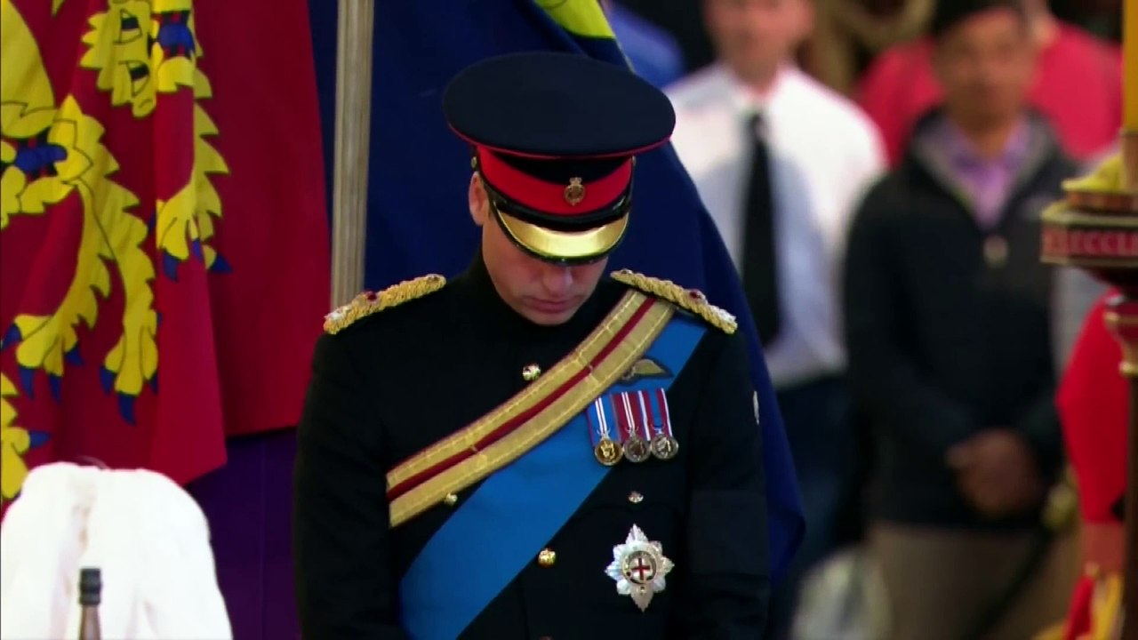 Queen Elizabeth II's grandchildren stand vigil at her coffin Queen