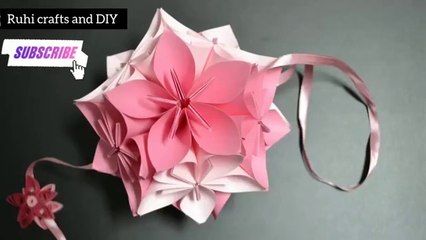 Video herunterladen: Amazing paper flower wall hanging decoration ideas/diy wall hanging/papercrafts/wall mate/home decors/ruhi crafts and diy #wallhanging #wallmate #ruhicraftsanddiy #diywallhanging #papercrafts #paperflower #homedecoration #homedecors #walldecoration