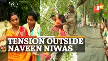 Woman climbs atop tree to end life in front of CM Naveen's house