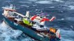 cargo ship's rescue operation by Helicopter in rough sea#short