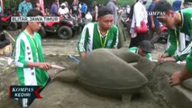 Keseruan Puluhan Pelajar Mengikuti Lomba Membuat Patung Pasir