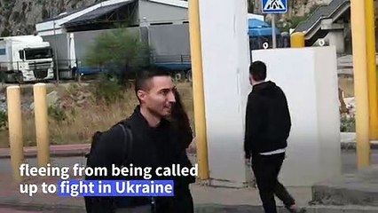 Russians flock to Georgian border after military call-up