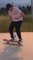 Man Perfectly Lands Bottle as He Performs Trickshot on Skateboard
