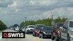 Desperate Florida residents queue for 'three hours' to get sandbags as Hurricane Ian looms for the Sunshine State