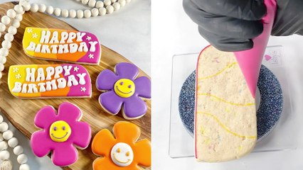 Baker turns tasty 'Happy Birthday' cookie into a GROOVY, COLORFUL delight