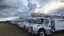 Line workers mobilize throughout Florida to prepare for power outages from Ian