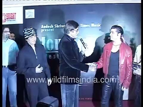 Amitabh Bachchan in trademark dark frames and a white goatie beard at Journey East 2 West launch