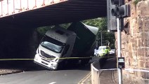 Lorry becomes stuck under railway bridge at Cameron Toll