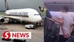 Bomb threat on SIA flight - fighter jets escort plane to Changi Airport, man held