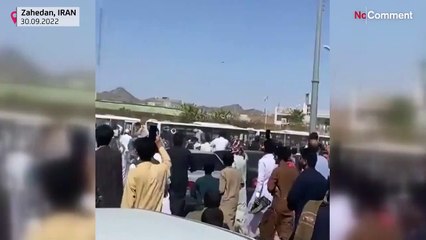 Videos circulating on social media showed gunfire and a police vehicle on fire