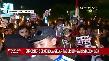 Duka Bagi Indonesia, Suporter Sepak Bola Gelar Tabur Bunga dan Nyalakan 1.000 Lilin di GBK