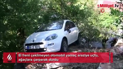 El freni çekilmeyen otomobil yamaç araziye uçtu