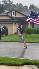 Hurricane Ian Welcomed by Man Waving America Flag