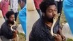 Deadly cobra lunges at Indian snake-catcher's face and bites him after he tried to KISS it
