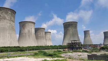 Watch the scenic view of a Thermal Power Plant from Train
