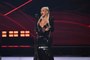 Christina Aguilera Paired Her Black Work Pants With a Latex Bustier