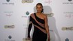 Samantha Mumba attends the grand opening of "House of Barrie" in Los Angeles