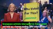 Greenpeace activists interrupted Liz Truss' speech and held up a banner reading Who voted for this?