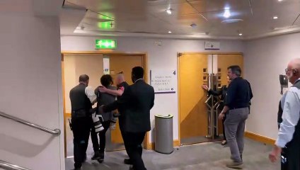 Press photographer dragged out of the Conservative Party Conference in Birmingham