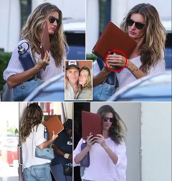 Downcast Gisele Bündchen enters Miami building - which is home to attorney offices - WITHOUT her wedding ring as marriage to Tom Brady hits the skids