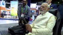 PM Modi driving a car in Europe while seated in India through 5G network. Check out the video.