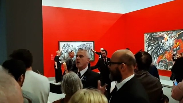 Protesters arrested after gluing themselves to Picasso painting at NGV in Melbourne