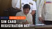 Marcos signs SIM Card Registration Act. Will it really stop scammers?