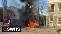 Russian missile strike on Kyiv leave vehicles in flames and billowing smoke as civilians bear the brunt of Putin's retaliation