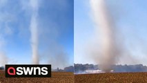 Tornado-like vortex rises from the ashes of field fire in Kentucky
