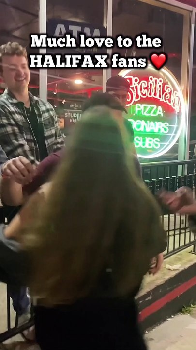 DJ Blitz taking pictures with fans in Halifax, NS