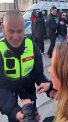 Police Officer invites woman to dance during Oktoberfest