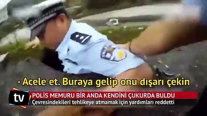 Çukura düşen polisten alkışlanacak hareket