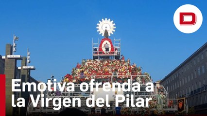 La emotiva ofrenda del Pilar que ha envuelto a la Virgen en un manto de flores