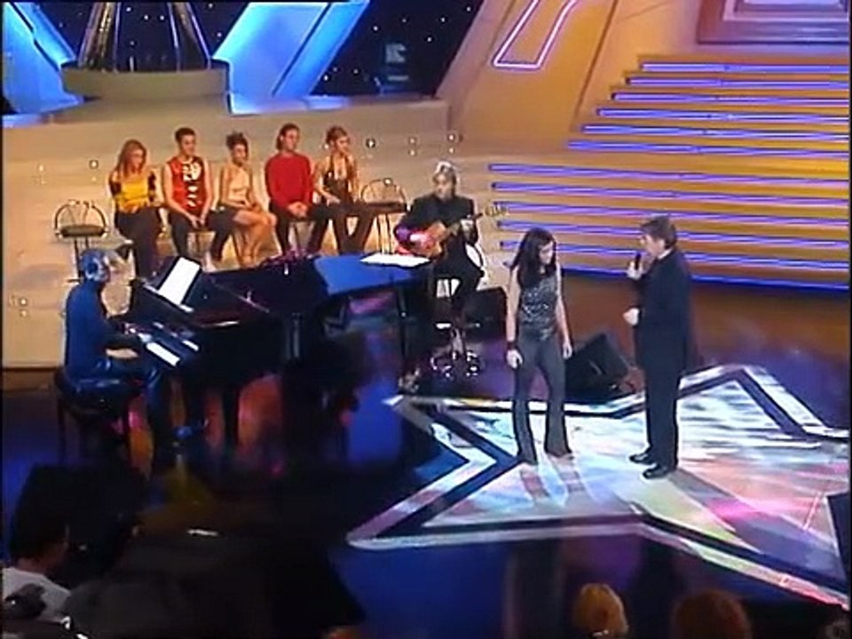 Jenifer chante "D'aventures en aventures" avec Serge Lama