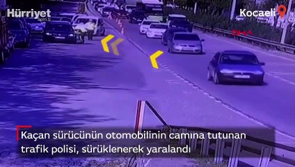 Kaçan sürücünün otomobilinin camına tutunan trafik polisi, sürüklenerek yaralandı