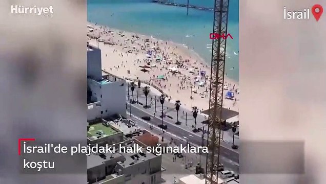 İsrail'de plajdaki halk sığınaklara böyle koştu