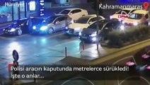 Polisi aracın kaputunda metrelerce sürükledi! O anlar kamerada