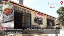 Bebeğinin cansız bedenini kucağında taşıdı