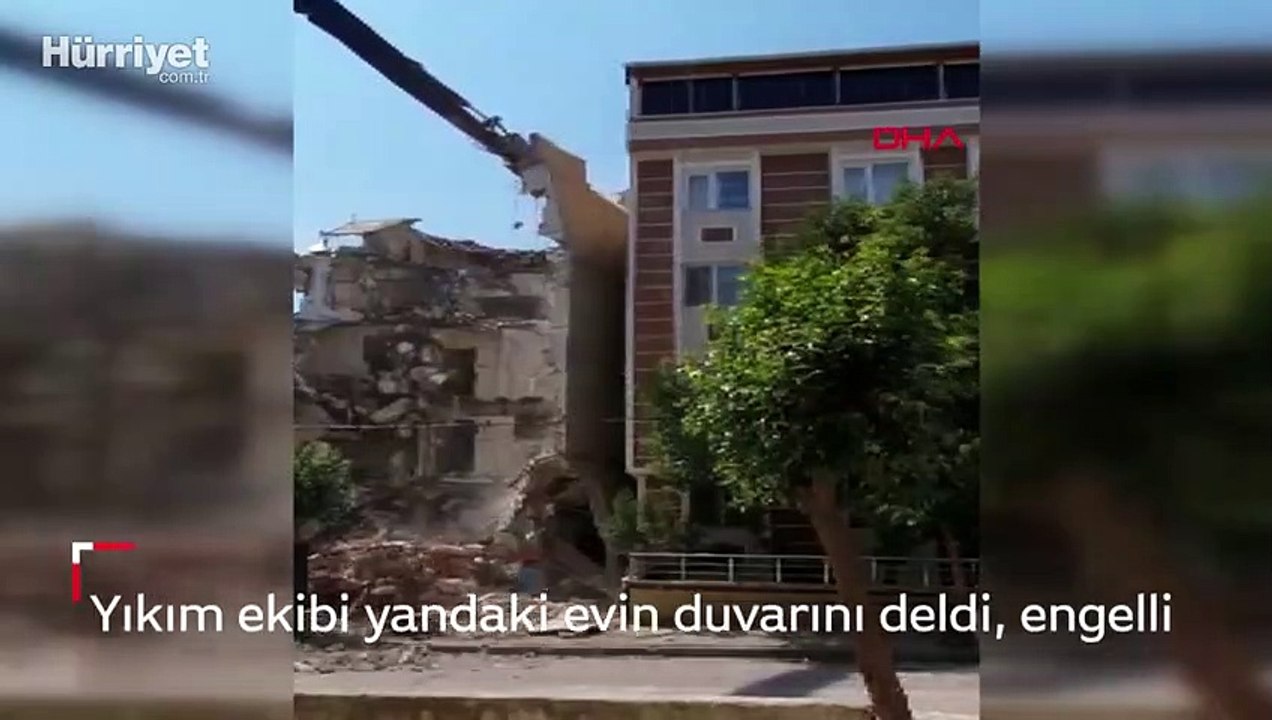 Yıkım ekibi yandaki evin duvarını deldi, engelli köpekleri ölümden döndü