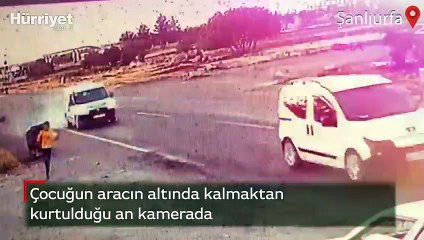 Çocuğun otomobilin altında kalmaktan kurtulduğu an kamerada