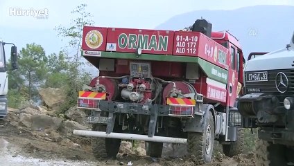 Soğutma çalışmalarının sürdüğü Manavgat yangın alanında yağmur mutluluğu