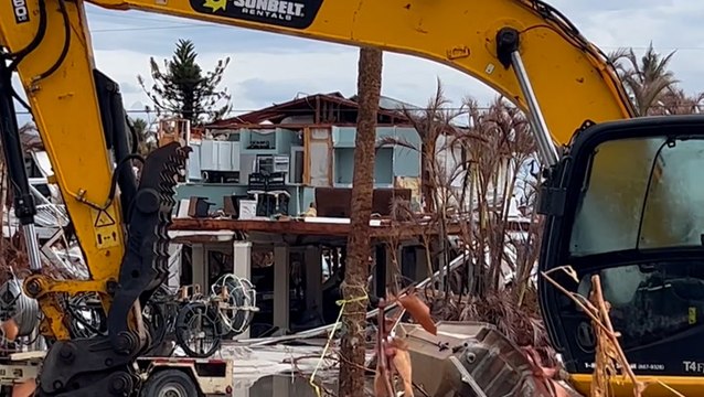 Meteorologists gather data on Ian's storm surge as thunderstorms delay cleanup efforts