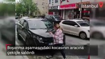 Boşanma aşamasındaki kocasının aracına çekiçle saldırdı