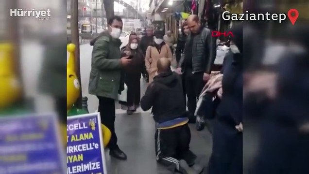 Engelli gibi davranan dilenci, zabıtayı görünce ayağa kalktı