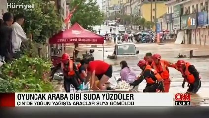 Çin'de yoğun yağışta araçlar suya gömüldü