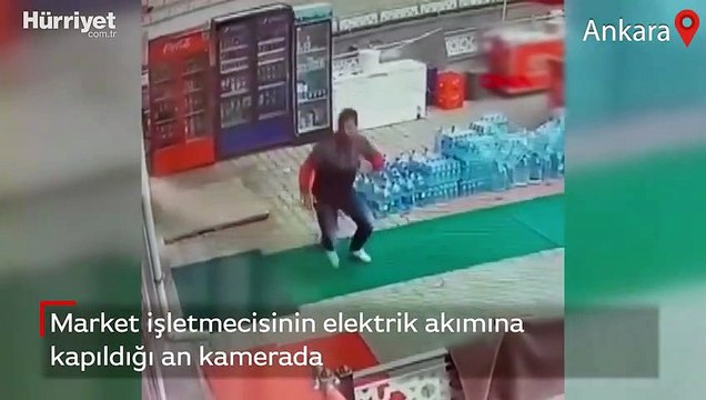 Market işletmecisinin elektrik akımına kapıldığı anlar kamerada