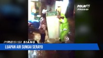 Bhabinkamtibmas Polsek Rawalo Polresta Banyumas Bantu Warga Yang Terdampak Luapan Air Sungai