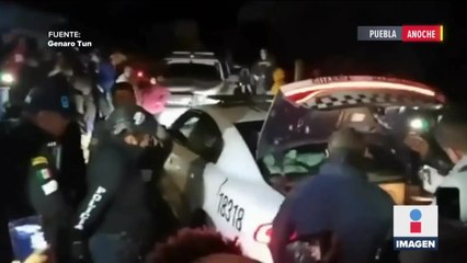 Detienen a policías estatales por robar mercancía de un tráiler en Puebla