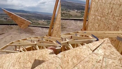 'Haters will say it’s fake' - Man fits a piece of wood on roof with a single throw... or did he?!