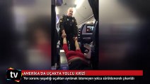 Polis, uçaktaki yolcuyu sürükleyerek çıkardı